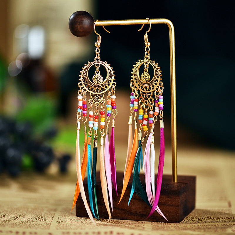 Wholesale Alloy Hollow Long Feather Earrings